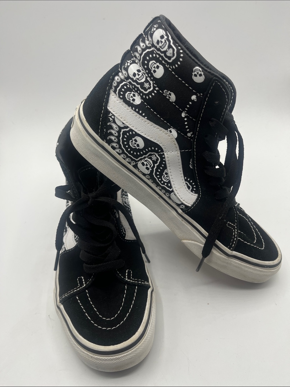 Vans Black High-Top Sneakers with White Skull Accents